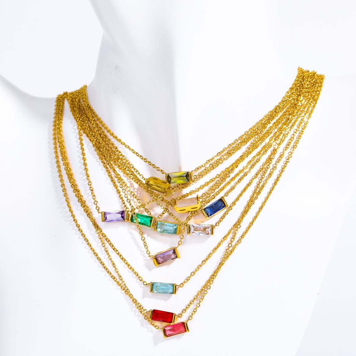 Ticora 12 birthstone necklace featuring colorful gemstones on a silver chain, showcasing the vibrant jewelry design.