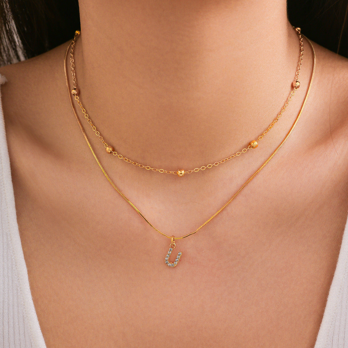 Simple diamond studded English letter pendant, double-layer necklace collarbone chain, versatile snake bone necklace for women