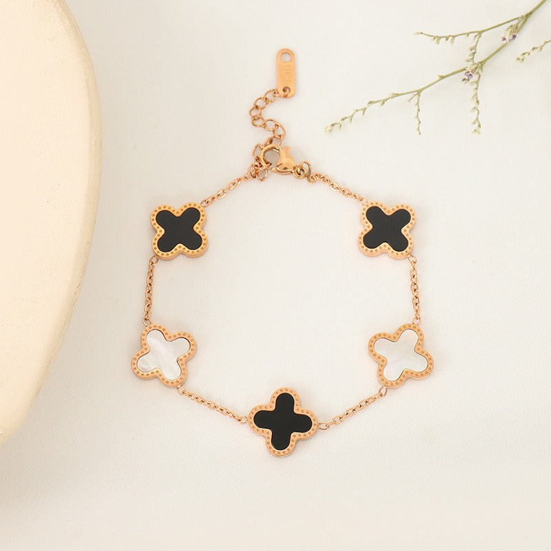 Eprolo women's minimalist Clover bracelet featuring five flower Fritillaria design with delicate silver band and floral accents.