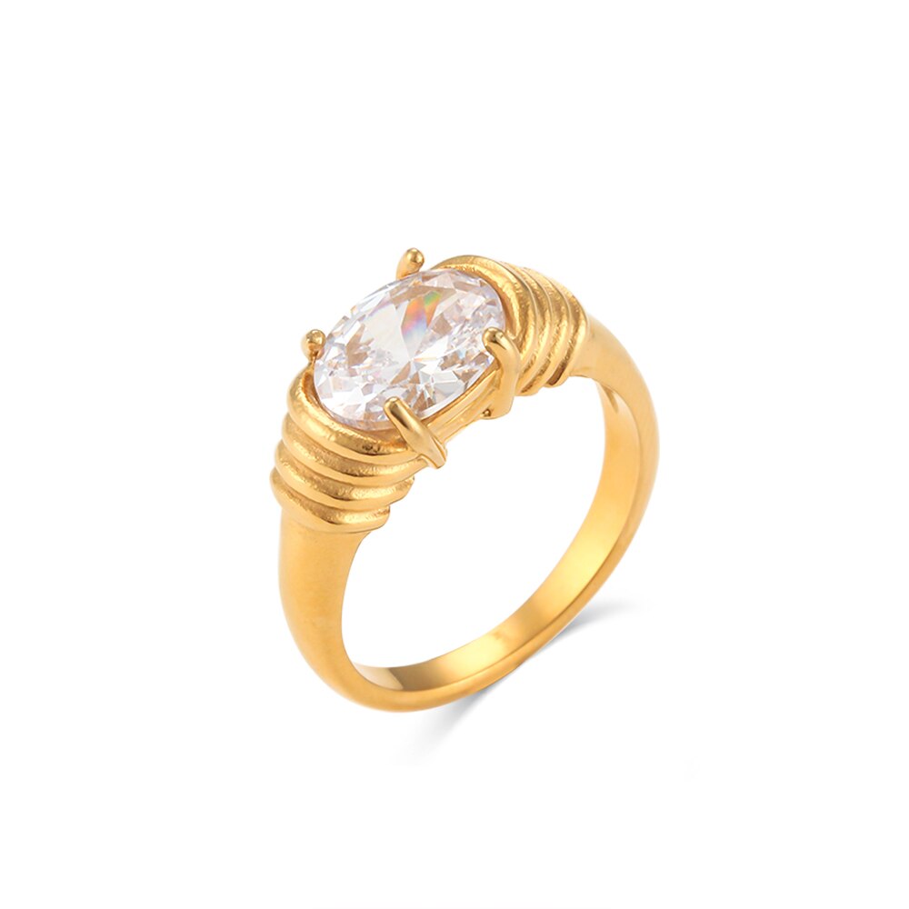 Eprolo oval-cut prong setting zircon ring with 18K gold plating, showcasing a sparkling oval zircon gemstone on a polished band.