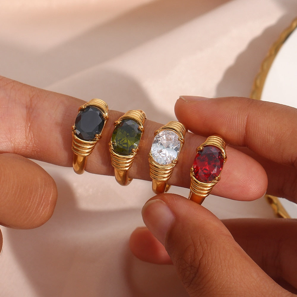 Oval-cut prong setting 3A zircon ring in 18K gold plated finish, showcasing the sparkling gemstone and elegant band detail.