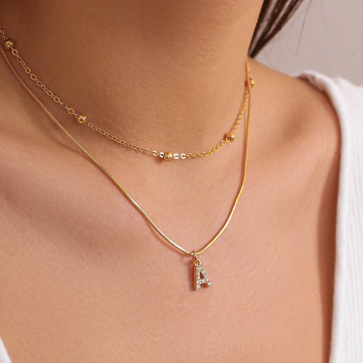 Simple diamond studded English letter pendant, double-layer necklace collarbone chain, versatile snake bone necklace for women