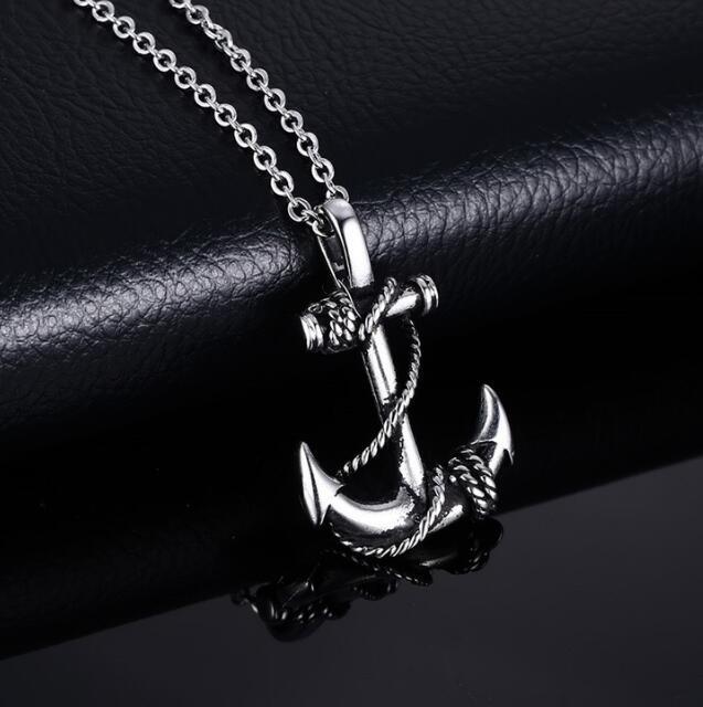 Men's stainless steel anchor pendant with pirate-inspired design, featuring a rugged nautical style suitable for casual wear.