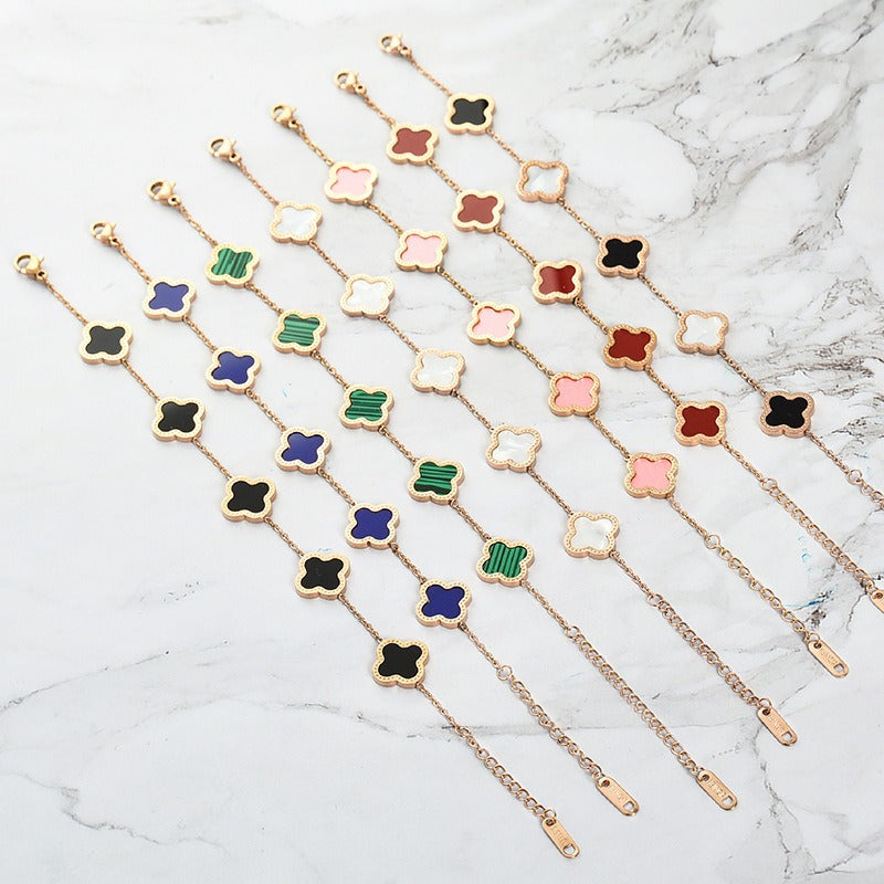 Minimalist women's Clover bracelet with five flower Fritillaria design by eprolo, featuring delicate flower charms on a sleek band.