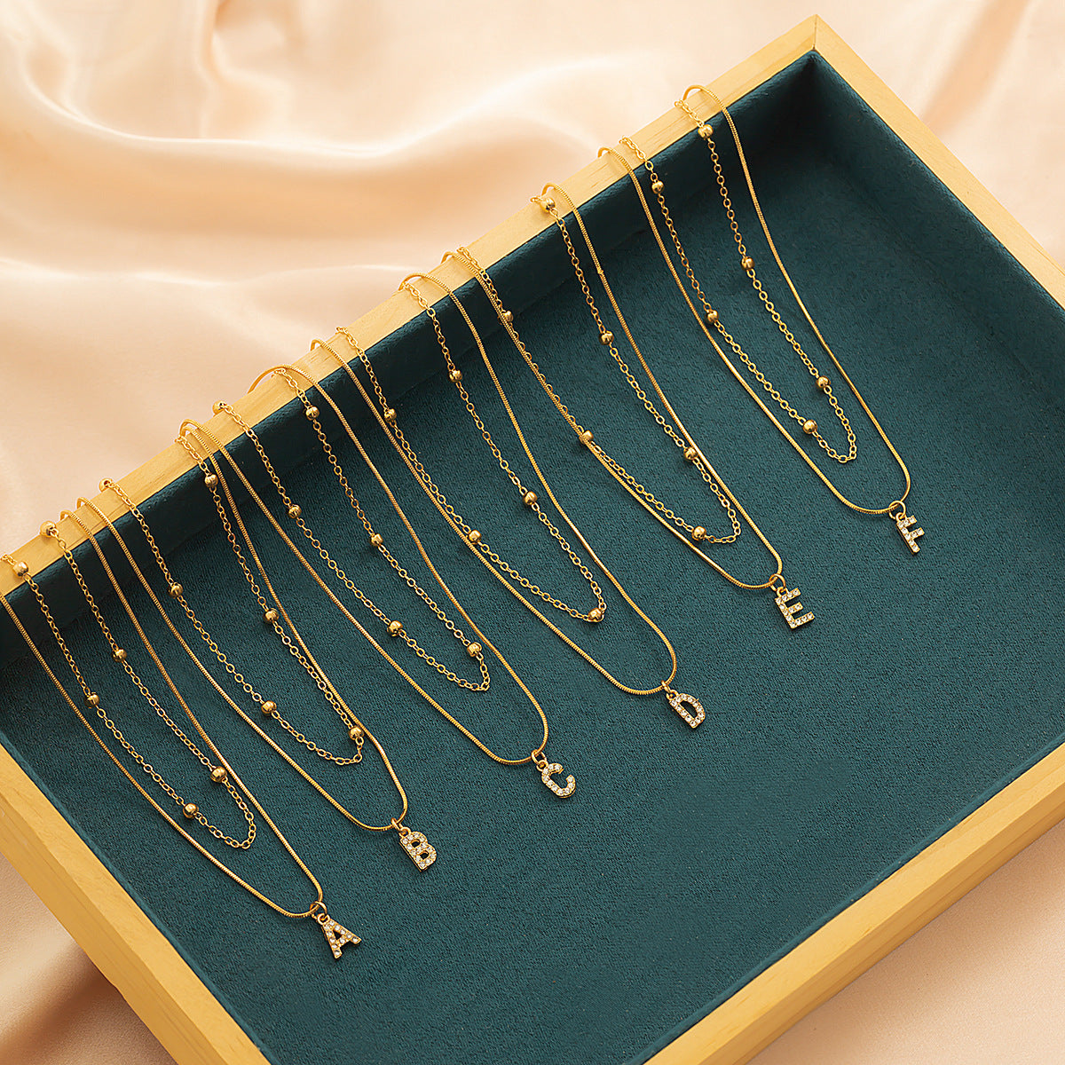 Simple diamond studded English letter pendant, double-layer necklace collarbone chain, versatile snake bone necklace for women