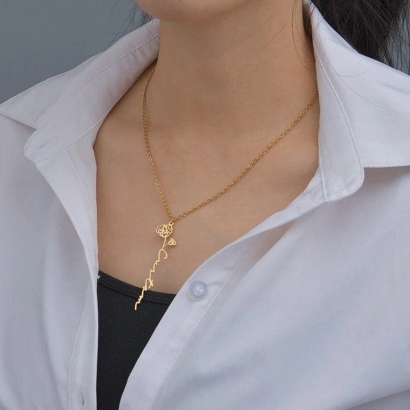 Elegant ladies rose gold name necklace with 12 flower-inspired English letter charms on a delicate clavicle chain by eprolo.