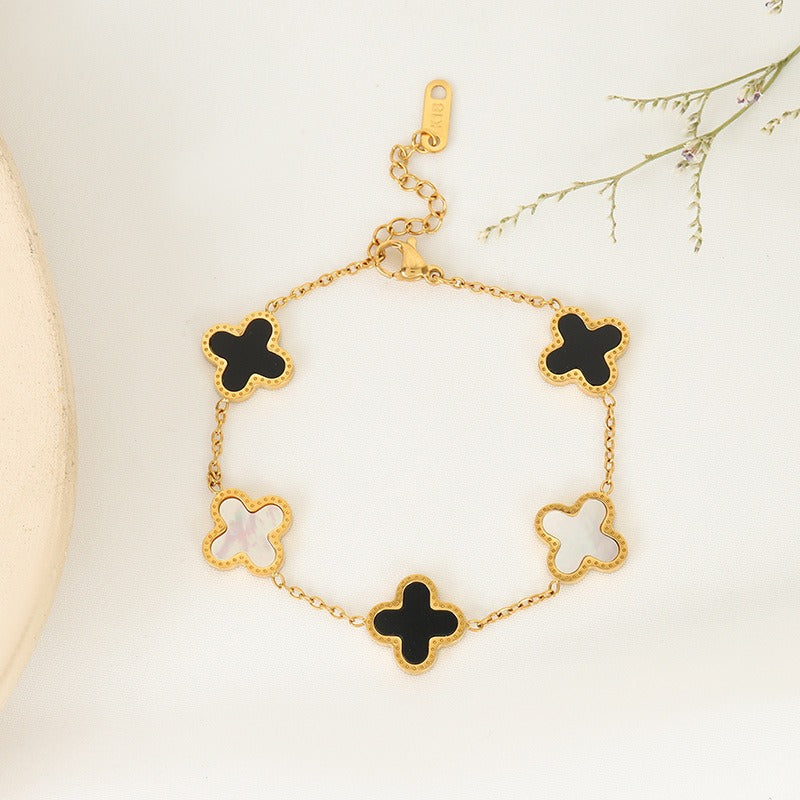 Minimalist women's Clover bracelet featuring five flower Fritillaria design by eprolo, showcased on a neutral background.
