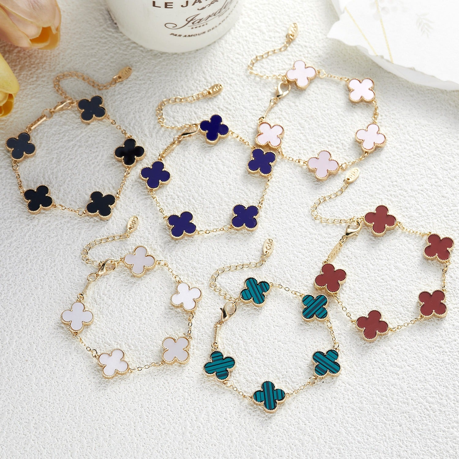 Minimalist women's Clover bracelet with five flower Fritillaria design by eprolo, featuring delicate flower charms on a sleek band.