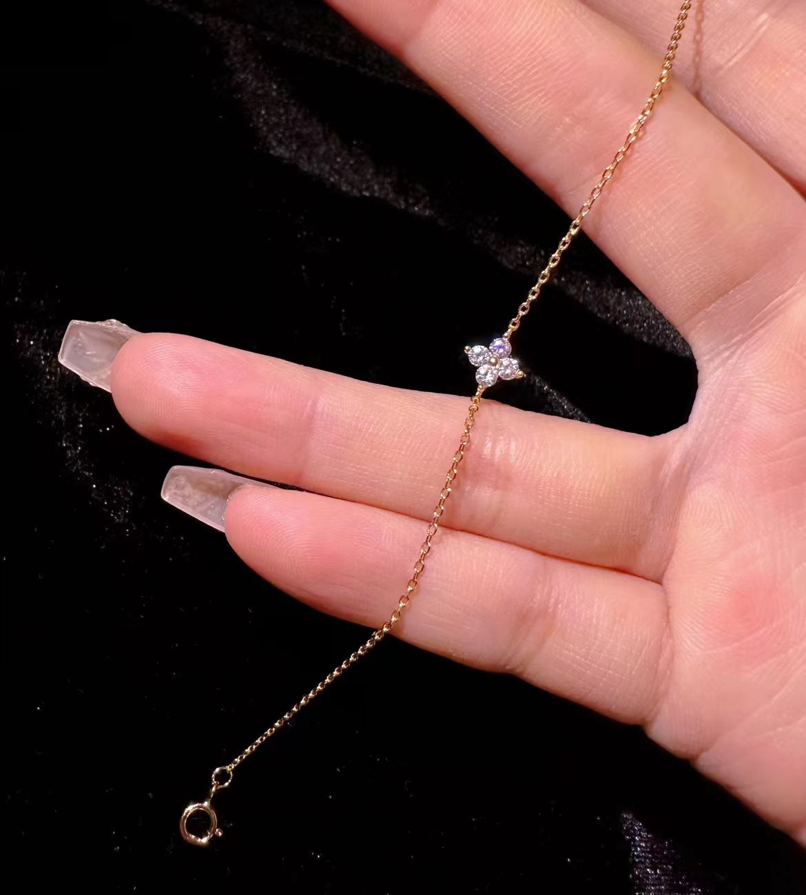Sterling silver mini flower zircon bracelet for girls, gold-plated 14k, featuring delicate floral design and fine jewelry craftsmanship.