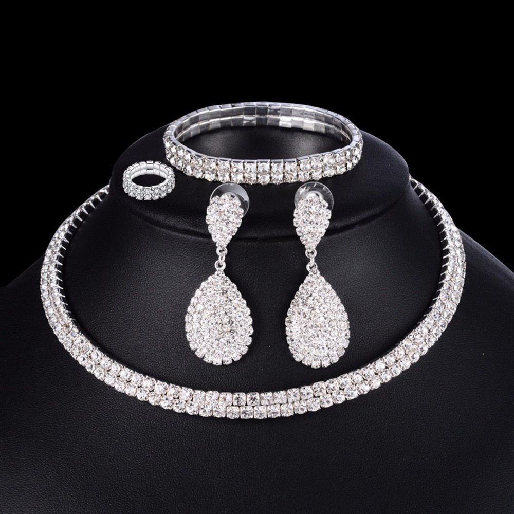 Elegant luxury wedding bridal jewelry set by eprolo featuring a sparkling necklace, earrings, and bracelet for special occasions.