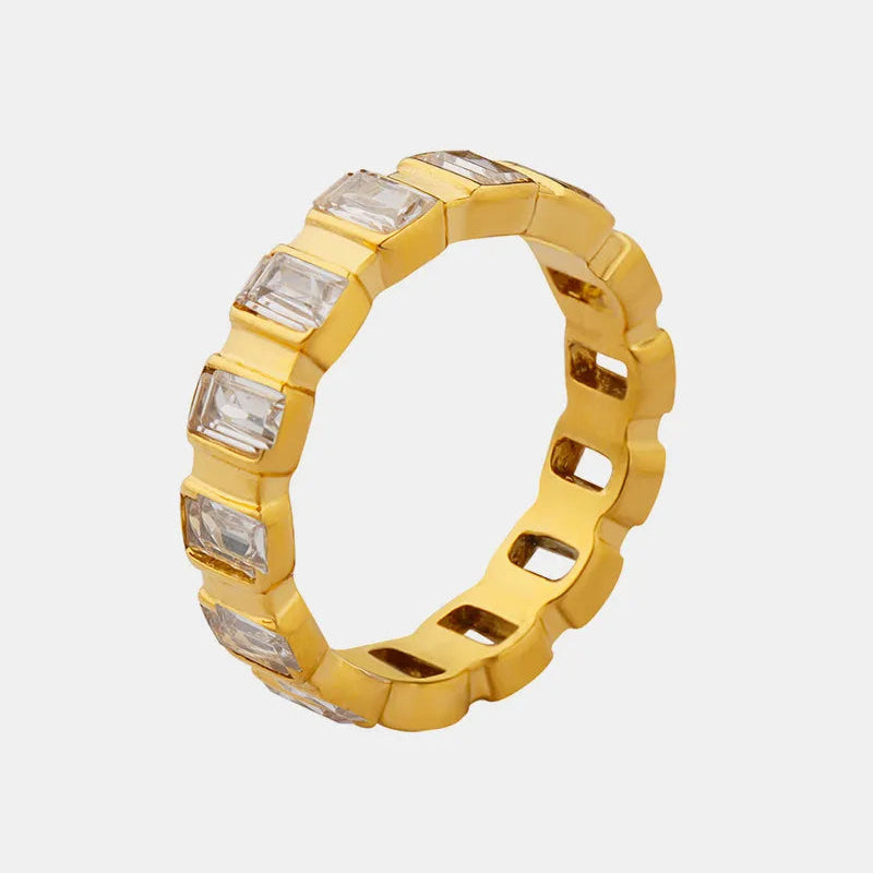Gold-plated titanium zircon ring with a sleek design, crafted from durable titanium steel, featuring sparkling zircon stones.