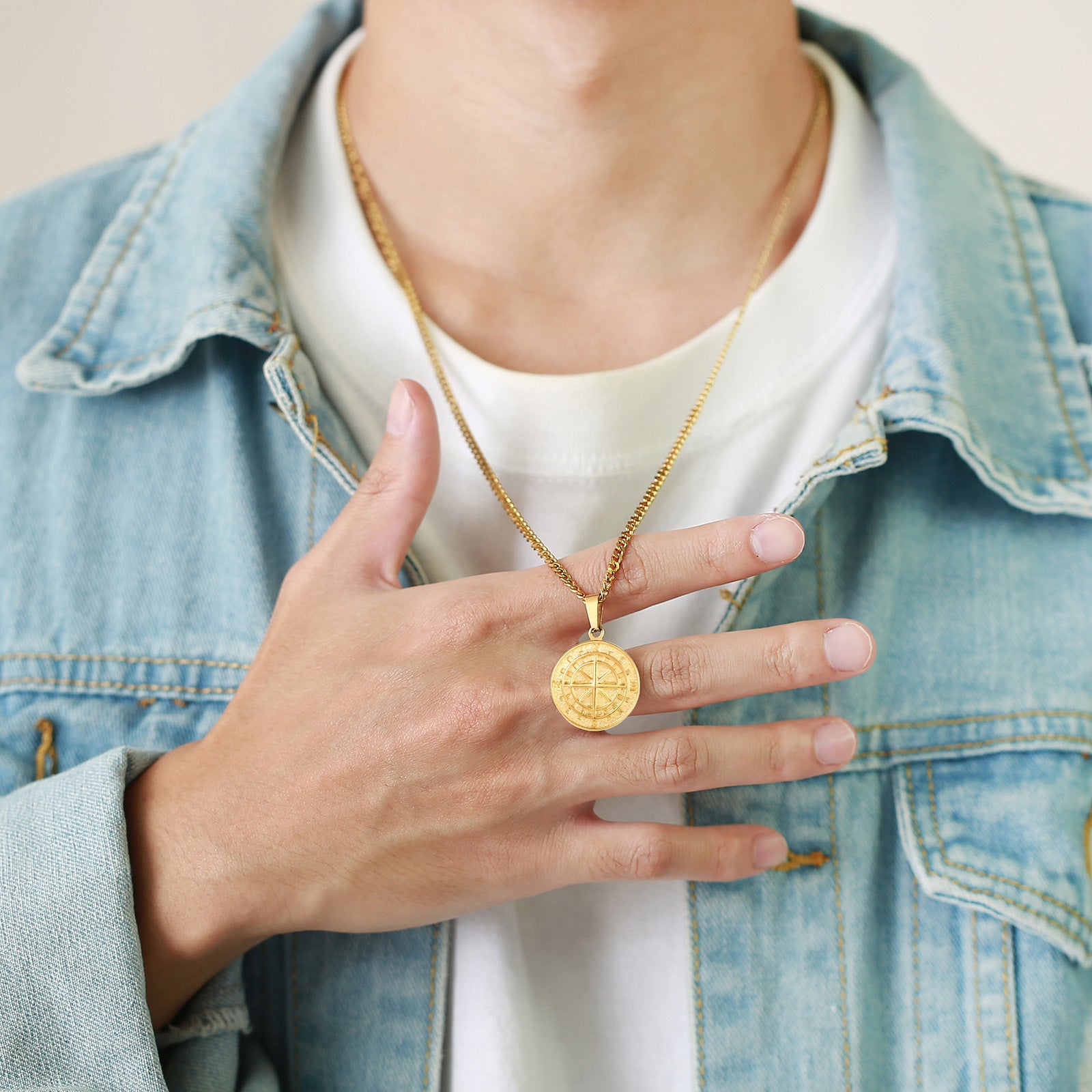 Gold compass coin pendant necklace for men, hip hop style, featuring a detailed compass design on a chain.