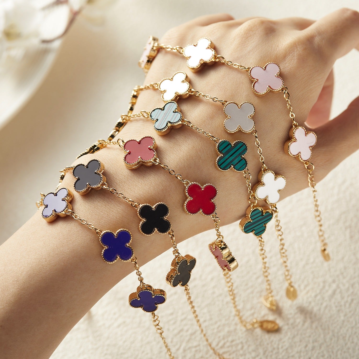 Eprolo women's minimalist Clover bracelet featuring five delicate flower Fritillaria charms on a silver-toned chain