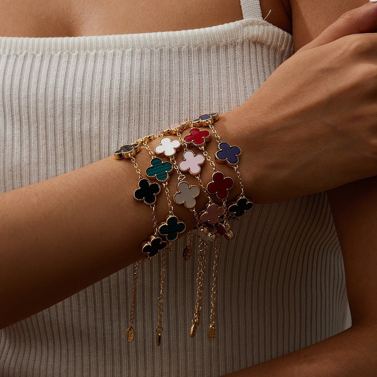 Eprolo women's minimalist Clover bracelet featuring five flower Fritillaria charms in silver tone, delicate and elegant jewelry piece