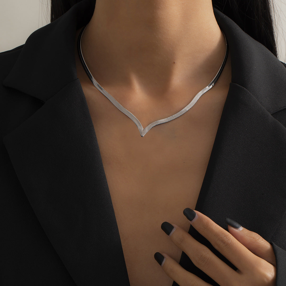 Metal snake bone V-chain necklace by eprolo featuring a bold street style design with a sleek, metallic finish.