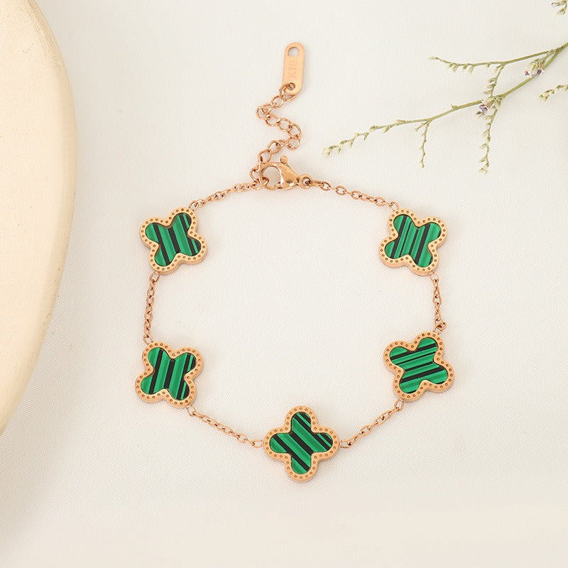 Minimalist women's Clover bracelet with five flower Fritillaria design from eprolo, featuring delicate floral accents and fine craftsmanship.