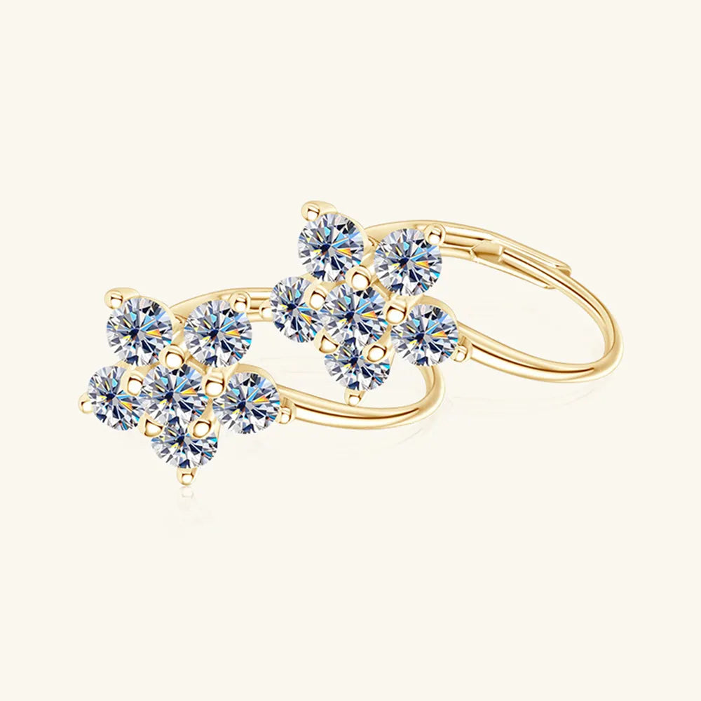 Sterling silver moissanite flower huggie earrings with 1.2 carats, crafted by eprolo, showcasing delicate floral design and sparkling gemstones.