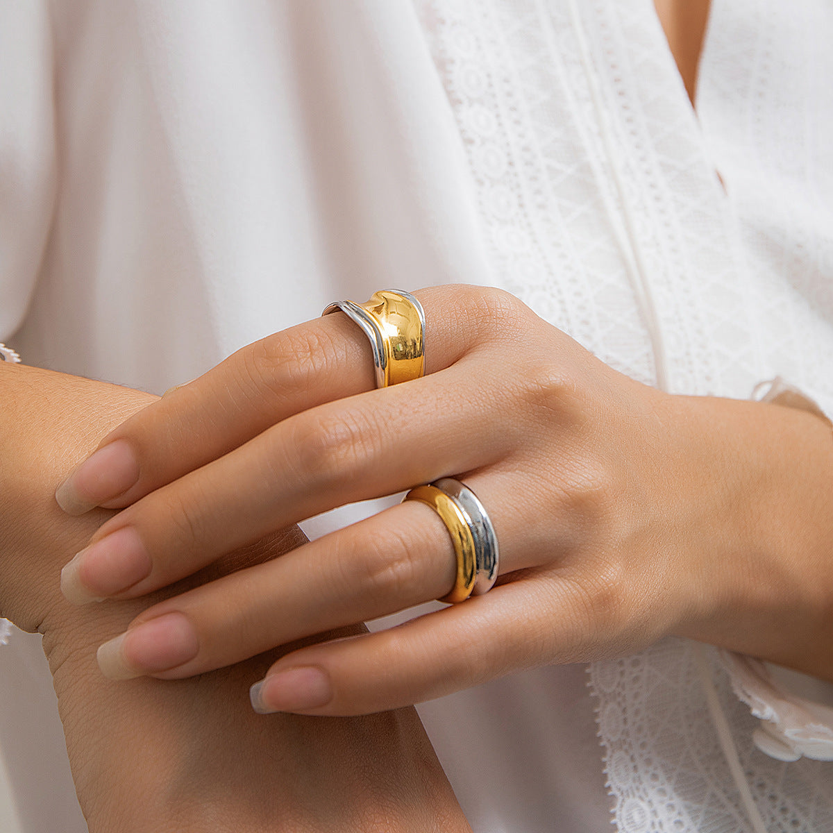 Eprolo retro alloy ring featuring irregular concave and convex ripple design, simple personalized style, on a hand.