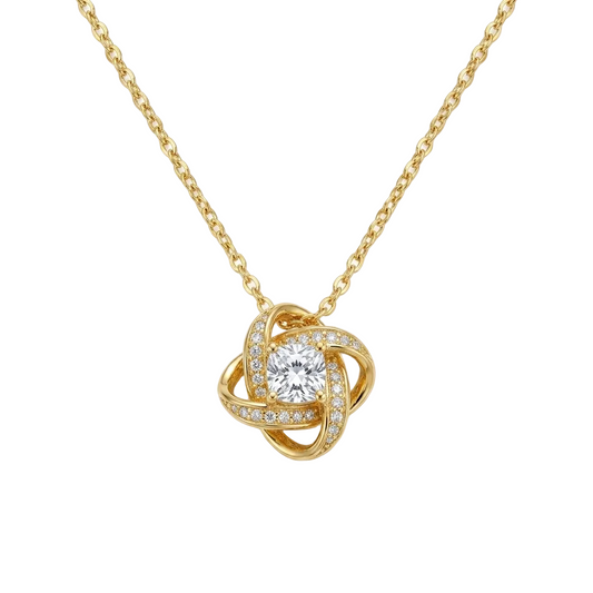 Gold plated lucky clover heart pendant necklace with spinning charm, featuring a sleek chain and intricate design.