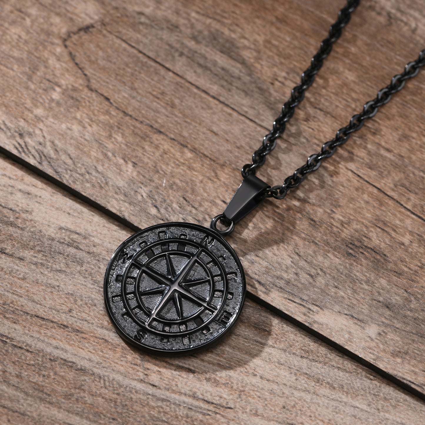 Gold compass coin pendant necklace for men, featuring a detailed compass design, ideal for hip hop style accessories.