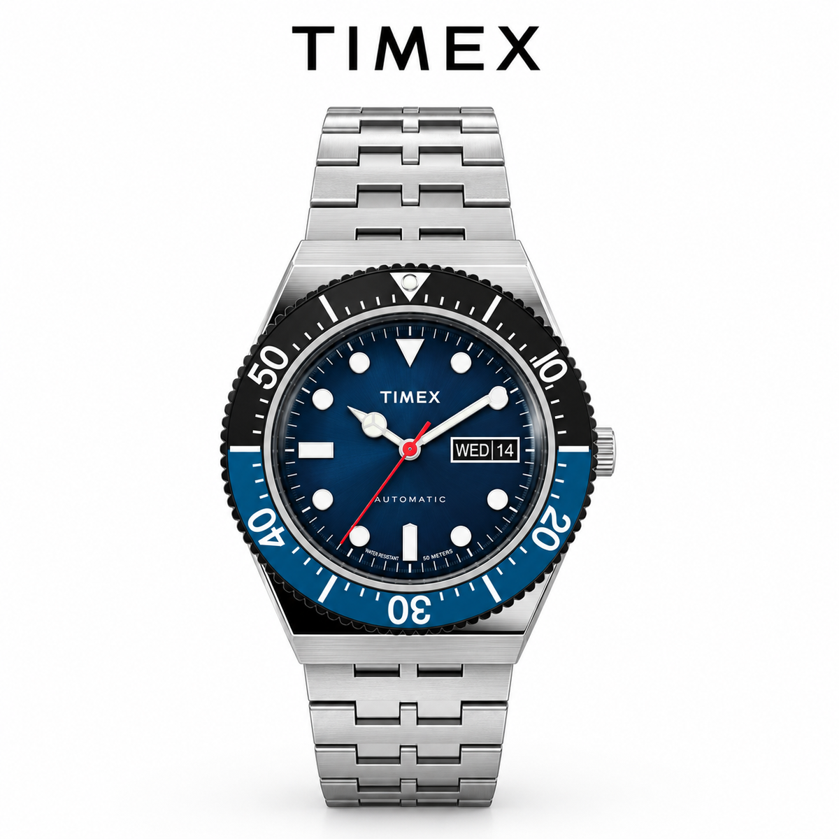 Ticora Timex automatic stainless steel dive watch with navy dial and rotating bezel, displaying time and date on wrist.
